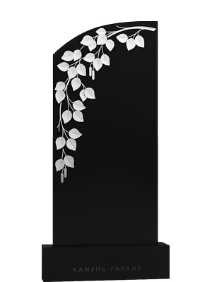 Памятник из черного гранита с растительным орнаментом