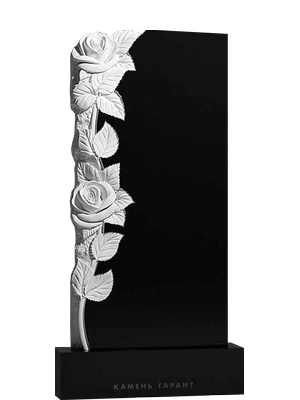 Памятник с нежными и изящными цветами, вырезанными из камня